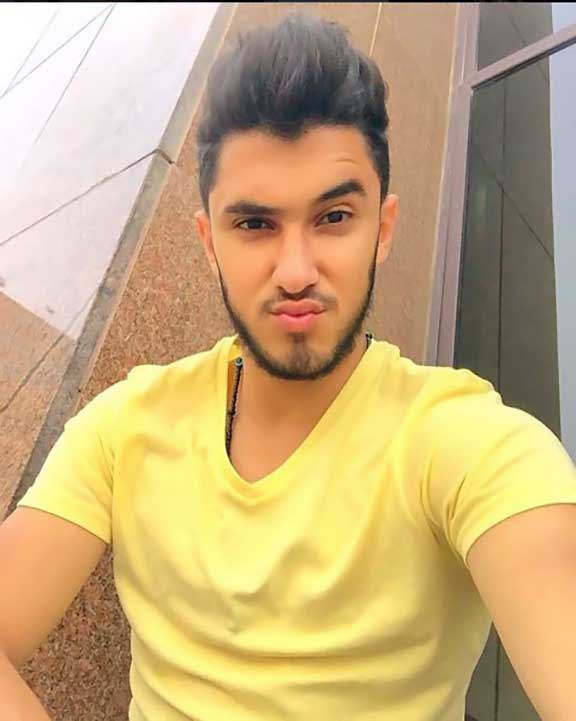 صور| لن تتخيلوا هذا الشاب الوسيم ابن اي مطرب شعبي شهير؟! 