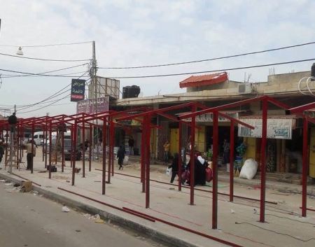 تركيب هياكل حديدية لاكشاك مجمع النثريات في جنين