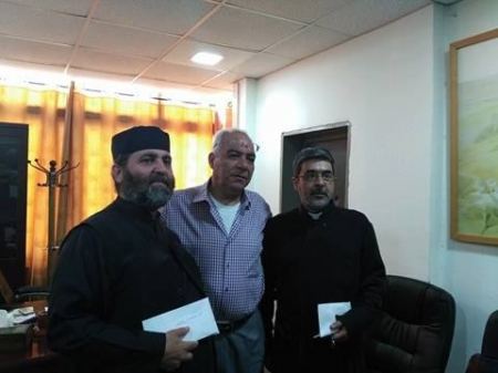 مخابرات جنين تسلم مساعدات مالية بقيمة 75 ألف دولار لـ11 جمعية أهلية وخيرية ولكنيستين في برقين والزبابدة