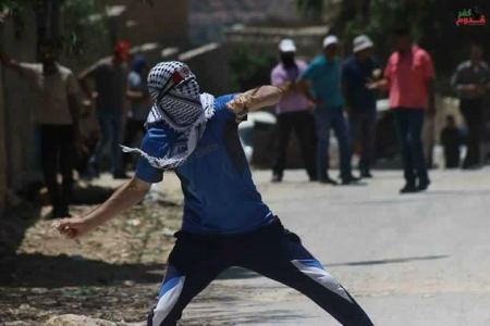 إصابات بينها متضامنة أجنبية في مواجهات عنيفة بكفر قدوم