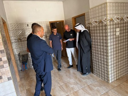 الشرطة والمجلس المجتمعي في يطا ينهِيان خلافاً على ملكية منزلين بعد 6 سنوات من النزاع