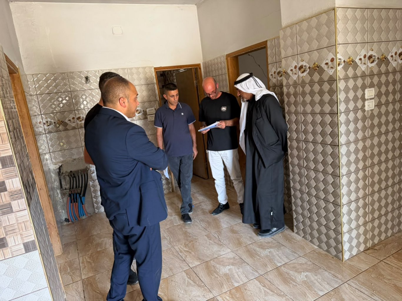 الشرطة والمجلس المجتمعي في يطا ينهِيان خلافاً على ملكية منزلين بعد 6 سنوات من النزاع