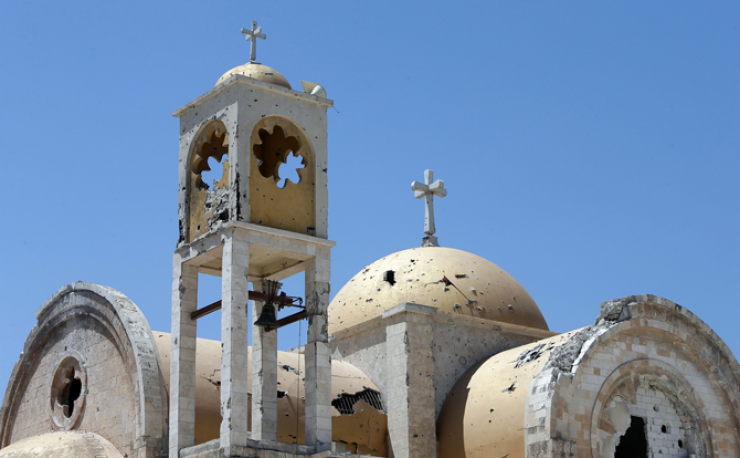 اجراس الكنائس تقرع تكريما لضحايا حلب