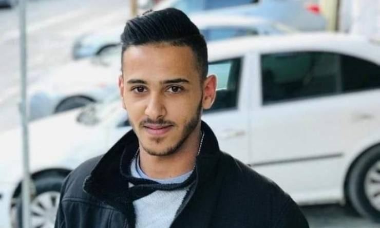 الاحتلال يزيل أعلام فلسطين وصور شهيد من العيسوية