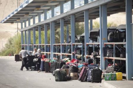 الشرطة تعتقل 38 مطلوباً على معبر الكرامة