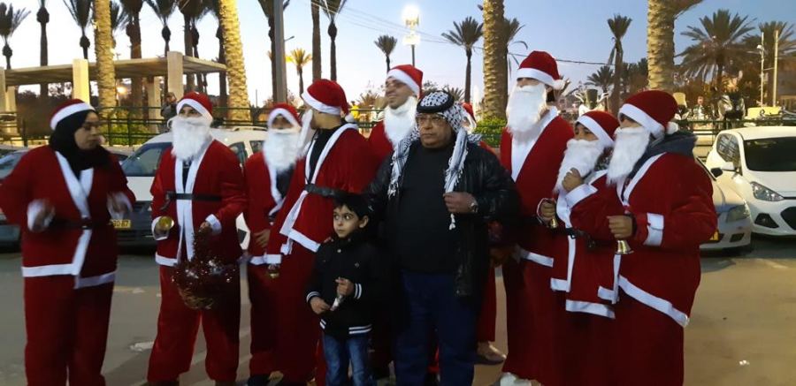 التجمع الوطني المسيحي يحيي عيد الميلاد في شوارع القدس